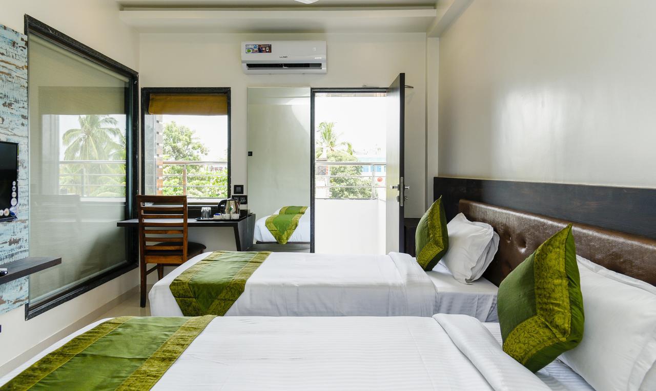 Hotel Treebo Malhaar Regency Chinchvad Esterno foto