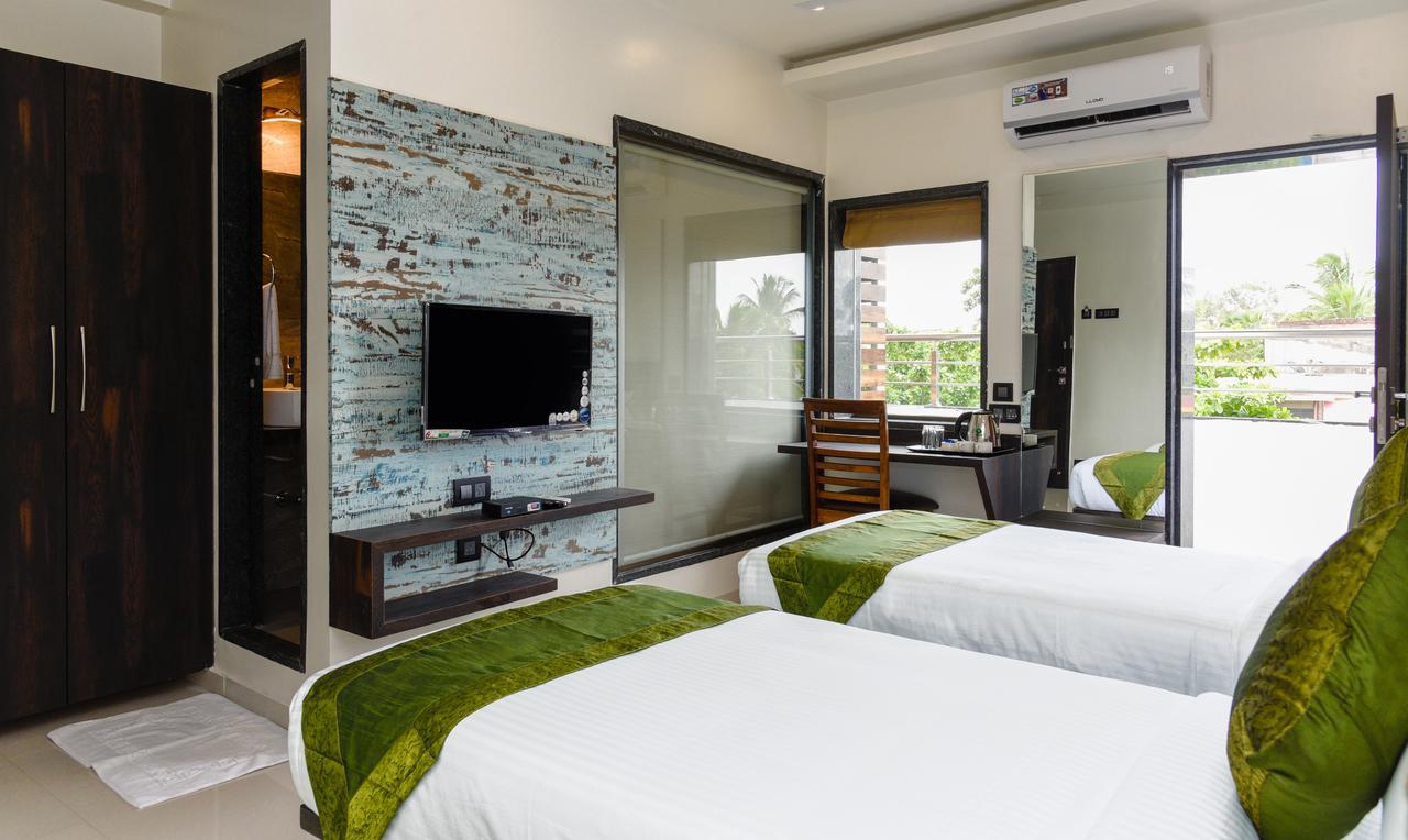 Hotel Treebo Malhaar Regency Chinchvad Esterno foto