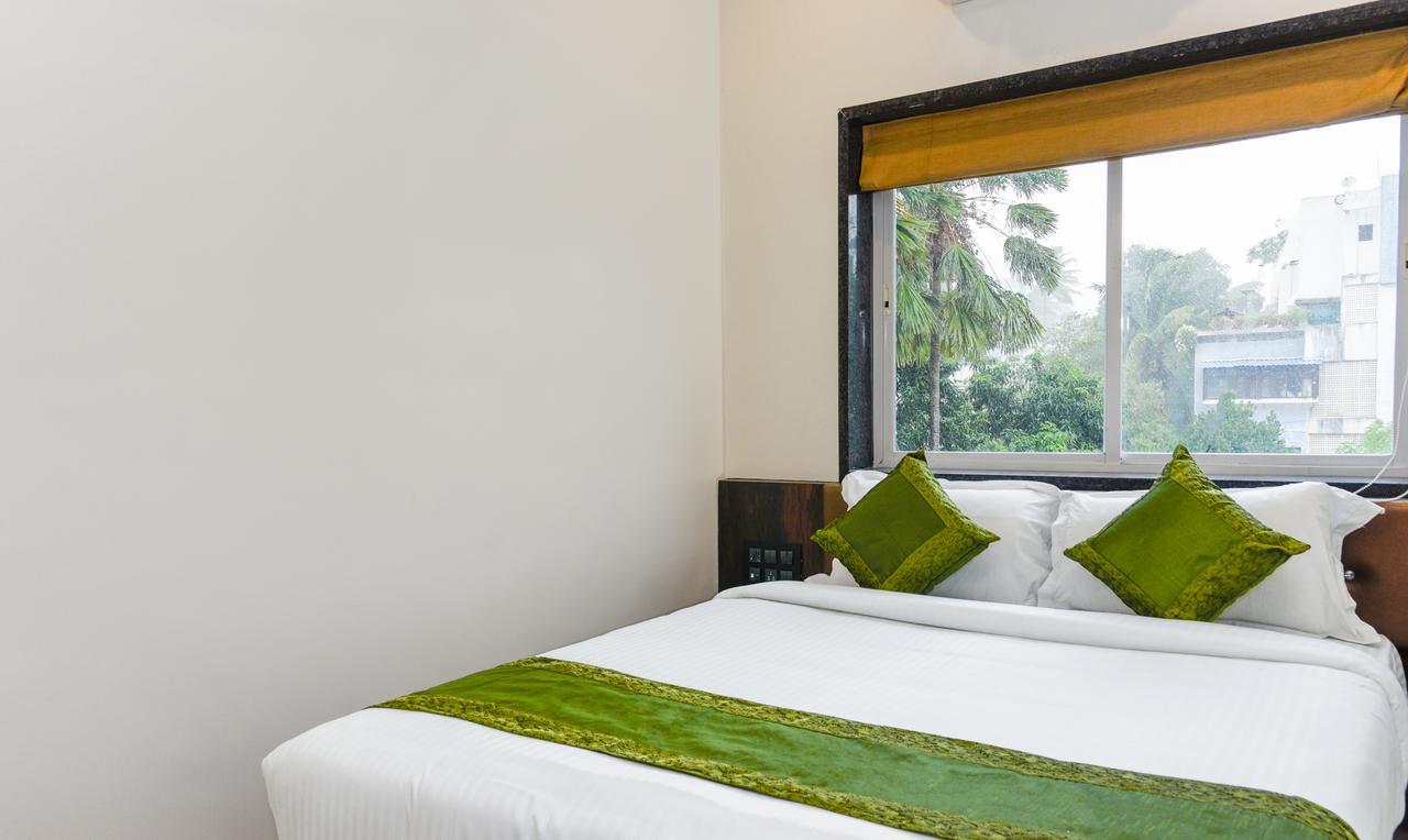 Hotel Treebo Malhaar Regency Chinchvad Esterno foto